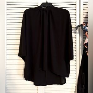 Black flowing and elegant blouse
